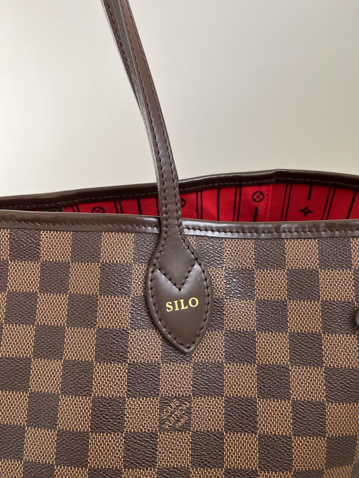 Louis vuitton neverfull online red trim